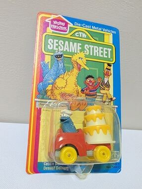 Sesame Street Blue Cookie Monster Red Truck Yellow Cake Toy